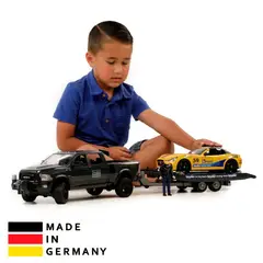 BRUDER - Juguete de Camioneta Dodge RAM con Auto Racing 02504