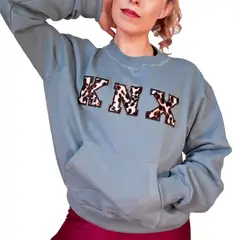 KINETIX - Polera Casual Fuzzy Franela Jade Animal Print Mujer