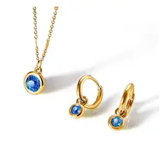 ESIKA - Set Collar + Aretes Safiro Septiembre Baño de Oro 24k y Cristales