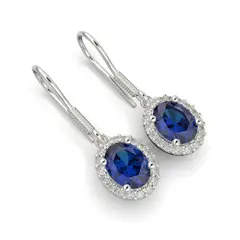 LUYA JOYERÍA - Aretes oval con corte circular