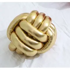 GENERICO - Cojín nudo en color dorado metálico Brillante