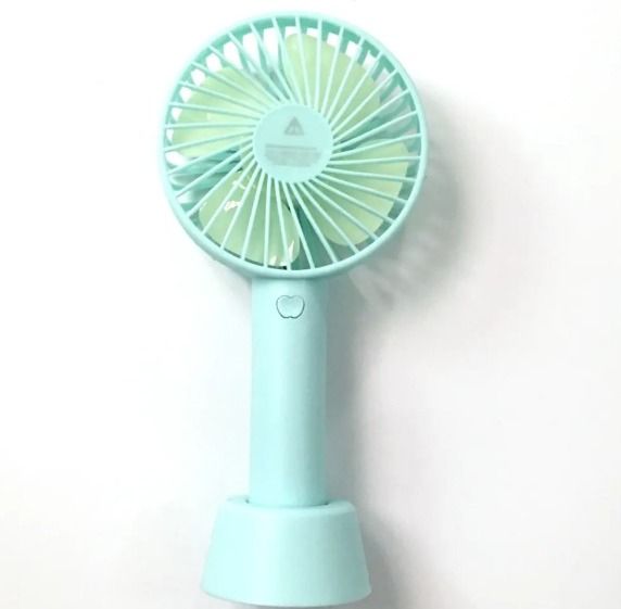 Mini ventilador de mano eléctrico recargable Celeste