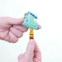 GENERICO - Llavero Rompe Ampolla Kamed Diseño Mini Crocs