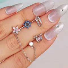 CLEO JOYAS & ACCESORIOS - Piercing Doble Flor Luz Plateado Acero