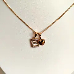 GENERICO - Collar Letra E + Corazon bañado en oro rosa 18 kilates