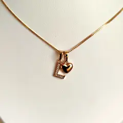 GENERICO - Collar Letra L + Corazon bañado en oro rosa 18 kilates