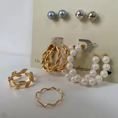 GENERICO - Set de aretes por 4 unidades y 2 anillos Girl two