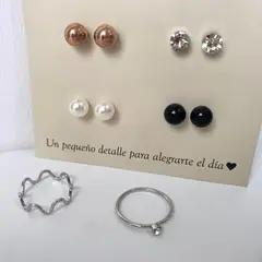 GENERICO - Set de aretes por 4 unidades y 2 anillos Girl seven