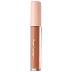 RARE BEAUTY - Corrector de ojeras Positive Light