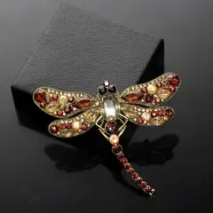 AMA OUTFITTERS - BROCHE CON PEDRERIA LIBELULA