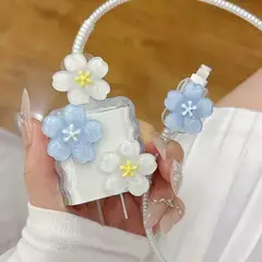 GENERICO - CASE PROTECTOR DE CARGADOR DE IPHONE DE FLORES HAWAIANAS CELESTE