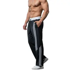 ENKI - Pantalón Hombre Deportivo Oversized Modelo Deportivo Oversized