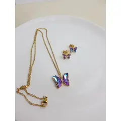 GENERICO - JUEGO DE ARETES Y COLLAR MARIPOSA LILA