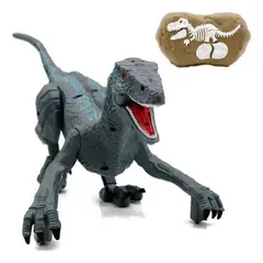 GENERICO - DINOSAURIO VELOCIRAPTOR A CONTROL REMOTO QUE CAMINA Y RUGE SONIDO RELISTA BOTA HUMO