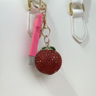 LLAVERO MANDARINA BRILLANTE + MEMORIA USB 64 GB ROSADO