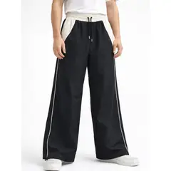 ENKI - Pantalón Parachute Ancho Hombre Tela Nova Bicolor Negro Estilo Urbano