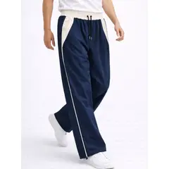 ENKI - Pantalón Parachute Ancho Hombre Tela Nova Bicolor Azul Marino Urbano