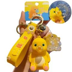 GENERICO - Llavero Nailong Burbujas sentado Sticker Viral Dinosaurio Amarillo