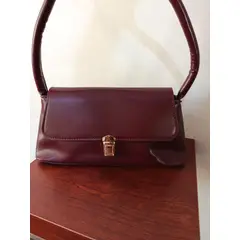GENERICO - Cartera para mujer Lisa color vino
