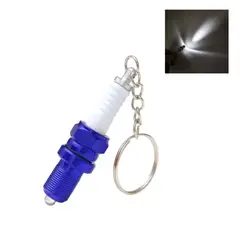 JET - LLAVERO DE BUJIA CON LED AZUL CON LUZ BLANCA