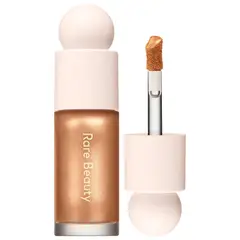 RARE BEAUTY - Iluminador Liquido Positive Light Liquid