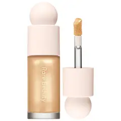 RARE BEAUTY - Iluminador Liquido Positive Light Liquid