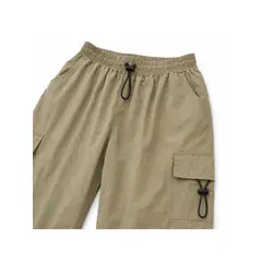 ENKI - Pantalón Parachute Cargo Beige Hombre Tela Mojada Oversize Bolsillos Elástico Moda Urbana