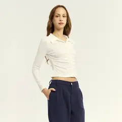 EXIT - Polo Delfina Hueso Mujer