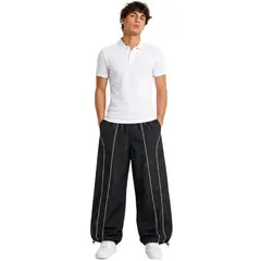 ENKI - PANTALÓN PARACHUTE HOMBRE TELA MOJADA NEGRO WIDE LEG CINTURA ELÁSTICA REGULADOR EN BASTA