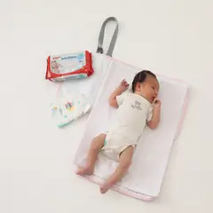 MATERNELLE - Cambiador Convertible en Bolso