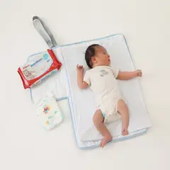 MATERNELLE - Cambiador Convertible en Bolso