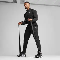 PUMA - Pantalón deportivo Tapered Essentials Woven Hombre